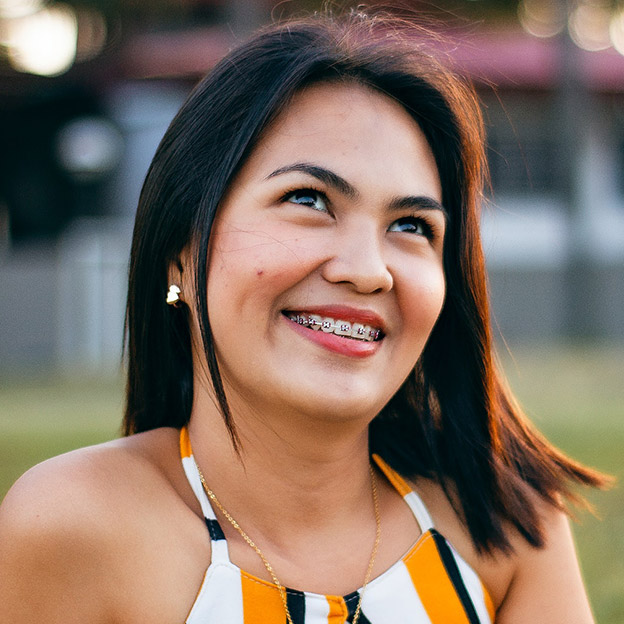 Affordable clear aesthetic tooth coloured braces for adults in Hawthorn by Dr Carolyn Ng, Specialist Orthodontist.