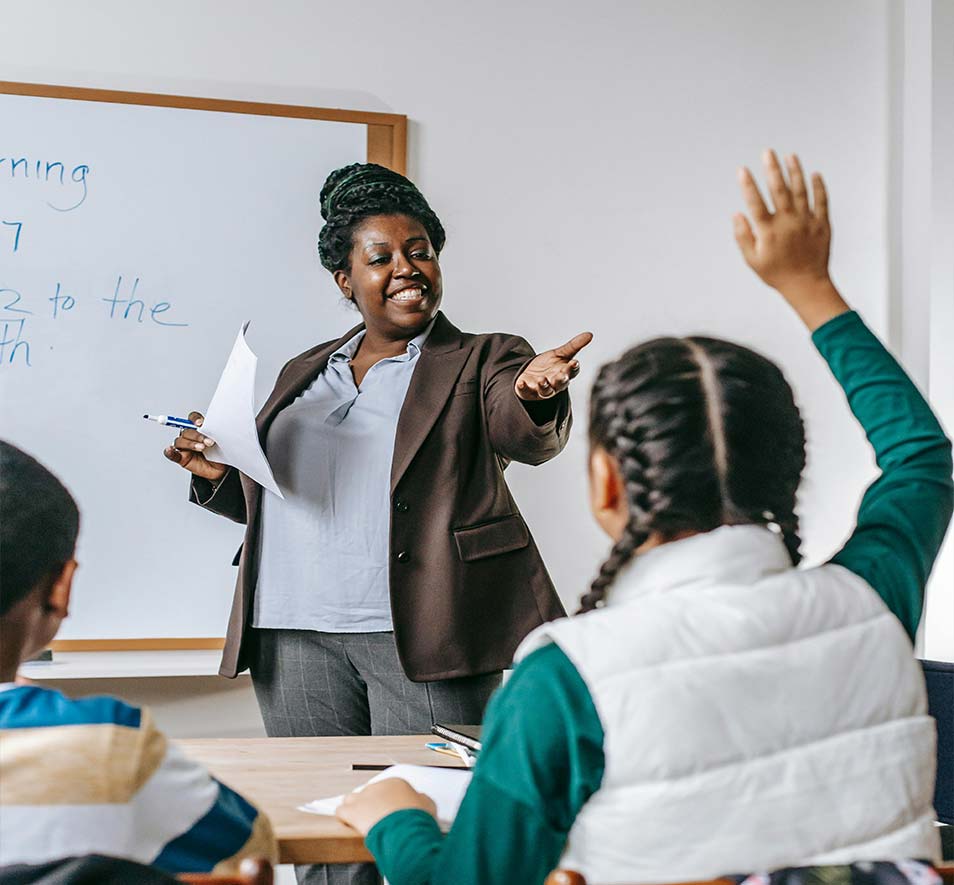 A teacher answering students questions
