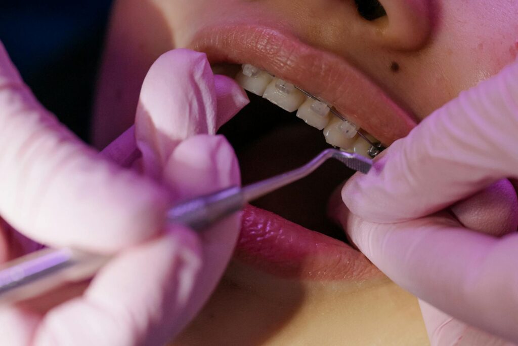 patient having their braces adjusted with Dr Carolyn Specialist orthodontist Hawthorn